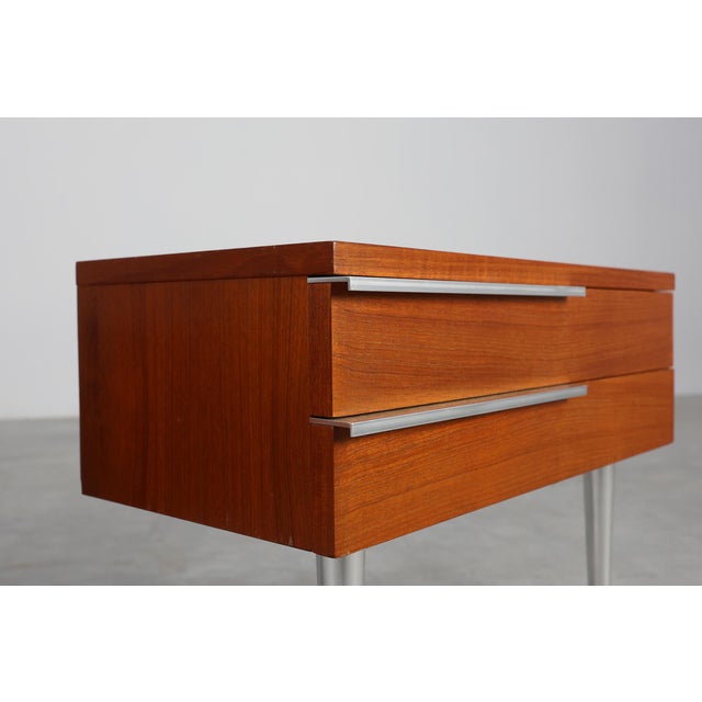 France / 1960 / 2 Nightstands / teal veneer and chrome / Mid-century modern A sleek and vibrant mid-century modern...