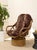 A wonderfully bold vintage tiki-style lounger featuring a sculptural bamboo frame paired with dramatic leopard print...