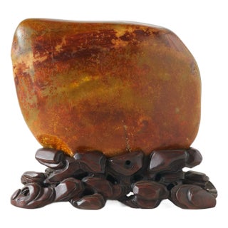 Hetian Jade Boulder on Carved Wooden Stand For Sale