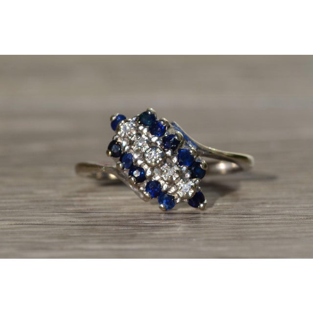 Light Gray The Roscoe: Ladies White Gold Bypass Style Cocktail Ring set with Diamonds and Sapphires For Sale - Image 8 of 10