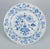 Meissen, Germany. A set of four Blue Onion Pattern dinner plates in porcelain. Hand-painted. First half of the 20th...