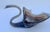 This Mid-Century Modern hand-blown glass bowl in the shape of an elegant swan features an amber and brown slag glass swirl...