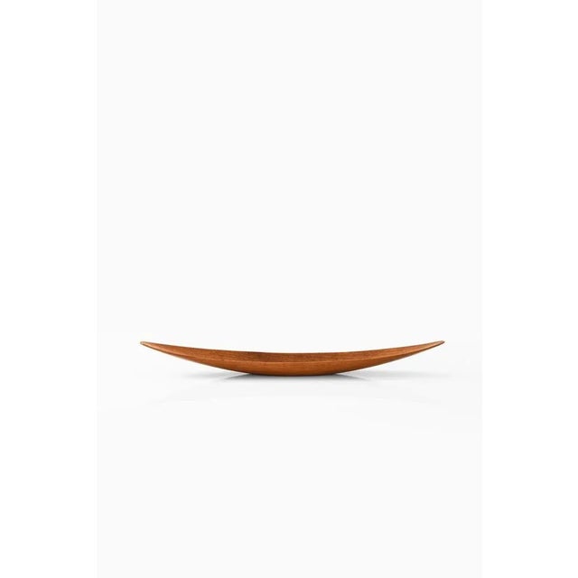 Large decorative bowl in teak by unknown designer. Produced in Sweden.