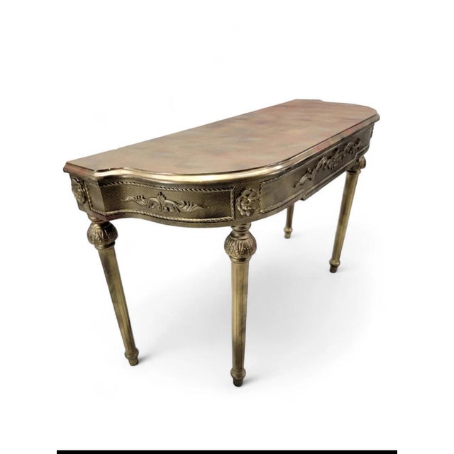 Vintage French Louis XVI Style Gold Gilt Demilune Console Table This vintage gold gilt console table with a rustic...