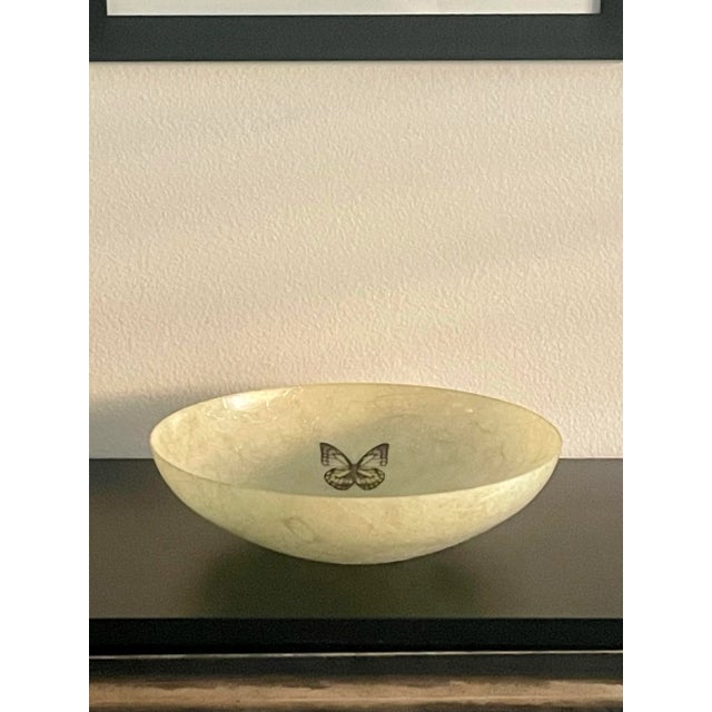 Large Mid-Century Modern Kimball Vesta fiberglass bowl featuring a butterfly design. A collectible item from the 1960s....