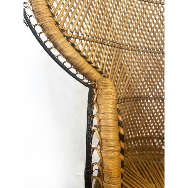 Impressive vintage wicker and rattan peacock chair or throne. Also known as the Bilibid chair, due to the manufacturing...