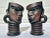 A pair of fabulous, very rare tiki mugs by ceramic arts studio in Madison Wisconsin. Titled African man and African lady....