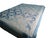 This handmade quilt features drunkards path pattern, offering a touch of charm to any room. Blue chambray fabric and white...