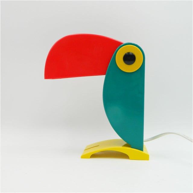 Beautiful Plexiglas table lamp designed by Enea Ferrari and produced by OTF in Italy in the 1960s. This toucan lamp is...