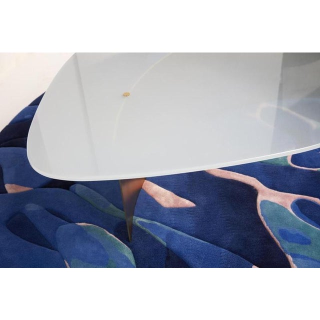 Ellipse arc coffee table by jennifer midoz dimensions: d 92 x w 148,5 x h 35 cm materials: lacquered glass, varnished...
