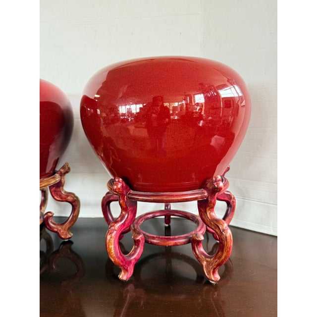 Chinese Pair of Large Chinese Red Oxblood Porcelain Urns Jardinieres on Carved Stands For Sale - Image 3 of 8