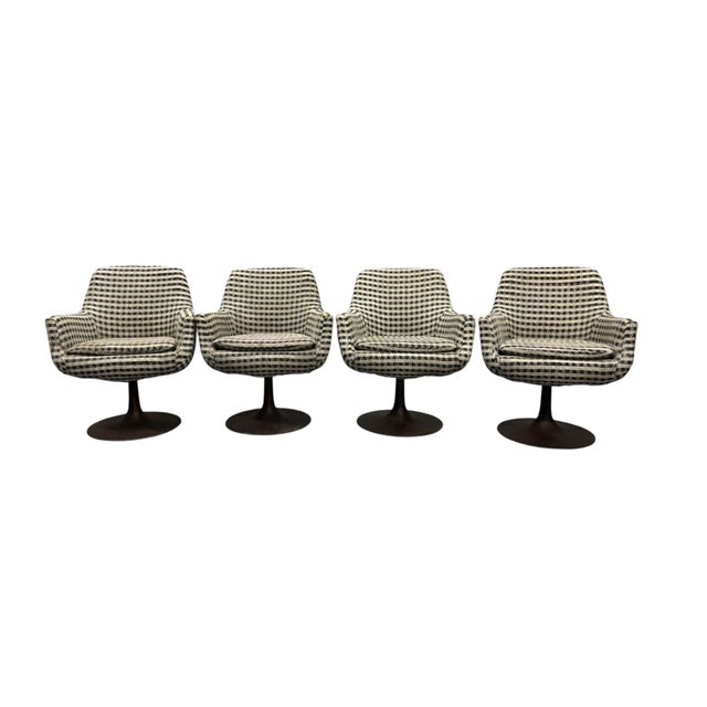 A set of four original 1960's mid century swivel pod chairs made by Daystrom Furniture of South Boston, Virginia....