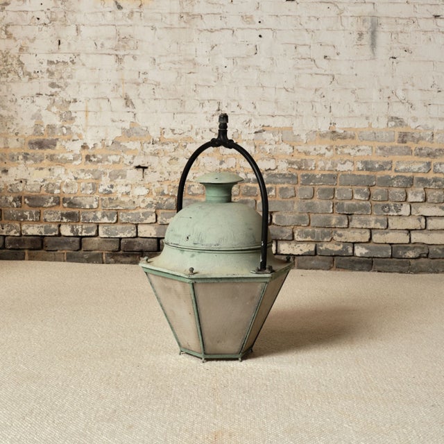 Add rustic charm and historical character to your space with this 19th century French copper lantern with handle, a...