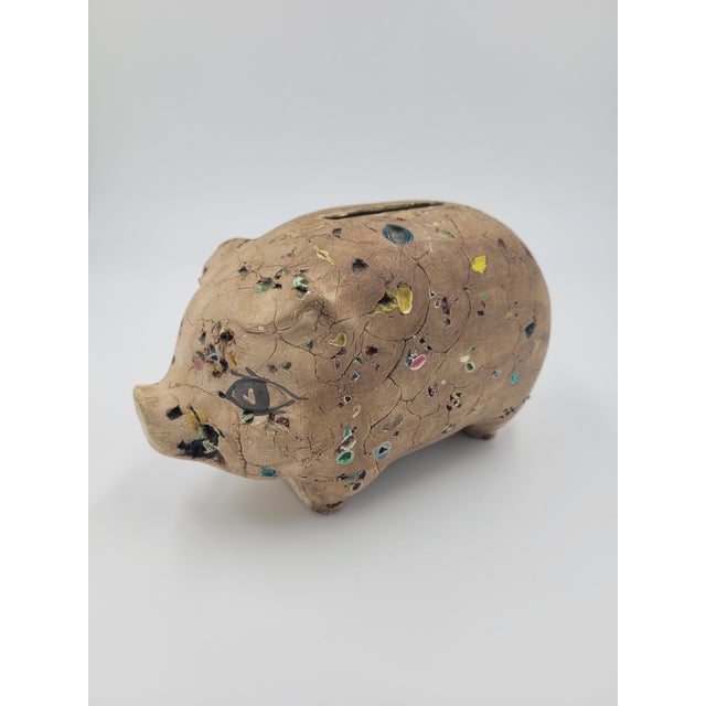 A charming and highly unique piece of mid-century folk art, this handcrafted ceramic piggy bank features a distinctive...
