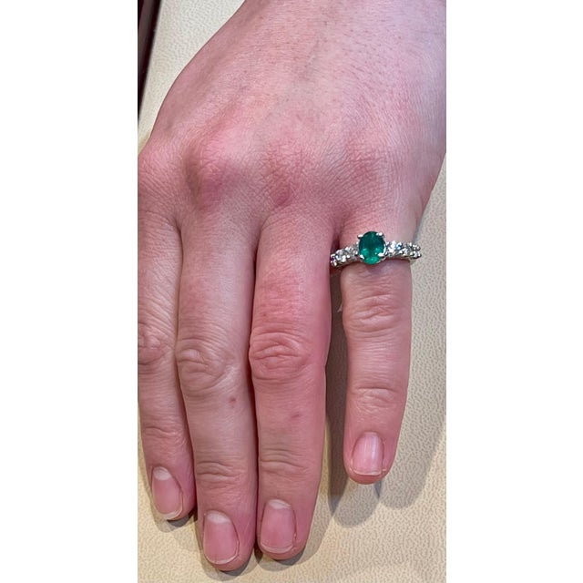 Natural 1.25 Carat Oval Cut Emerald & 0.90 Carat Diamond Ring Platinum For Sale In New York - Image 6 of 18