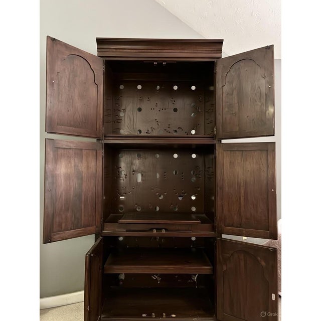 Ethan Allen Cherry Media Armoire is the perfect addition to a bedroom, office or living area.. The versatile interior...
