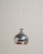 Chromed metal diffuser with a globular silhouette, tapered neck, and white lacquered interior. Scandinavia, 1960s. Pendant...