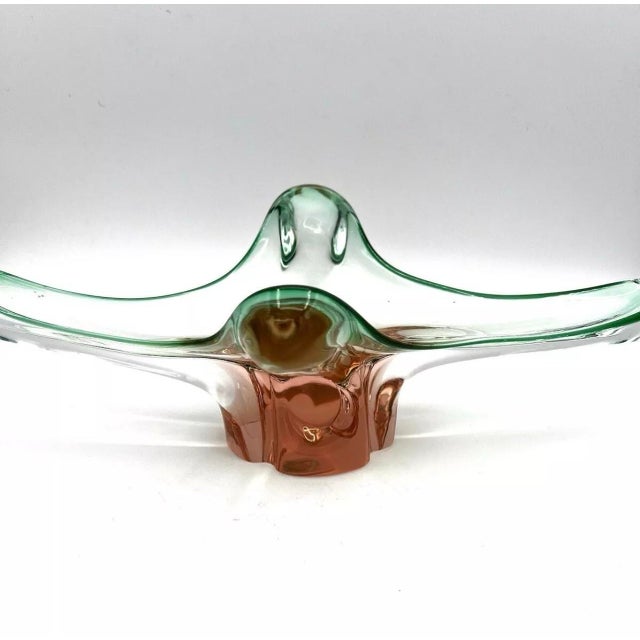 Stunning bowl by Czech designer Josef Hospodka. Made using two colored glasses in pink and green. It is a sturdy piece...