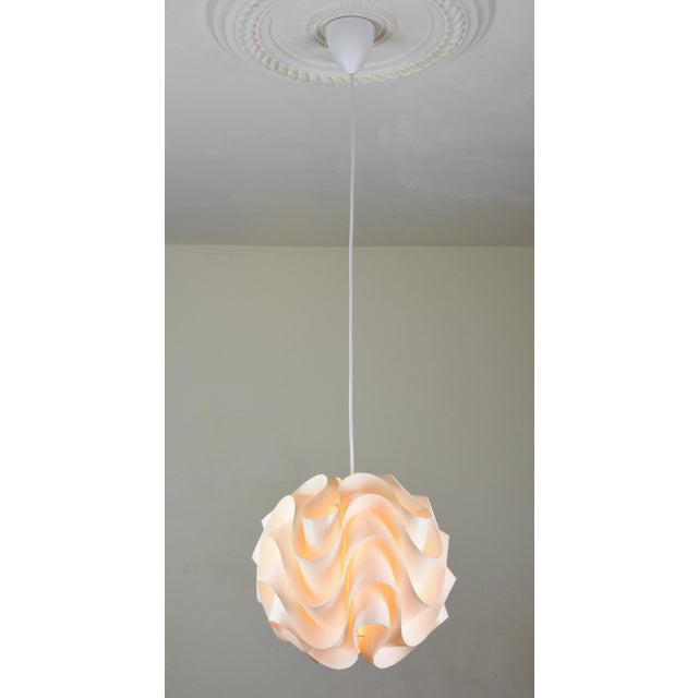 A Model 172 pendant designed by Poul Christiansen for Le Klint, Denmark. The Model 172 is one of Le Klint's most...