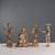Triptych clock in gilt bronze and porcelain with plant motifs. The porcelain pieces feature refined paintings of bouquets...