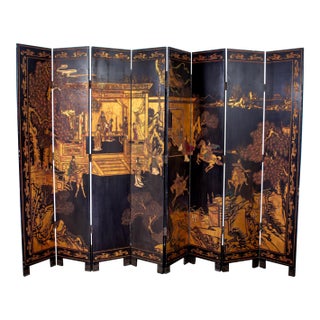 Chinese 8 Panel Black Coromandel Folding Screen W/Gilded & Hand Painted Intaglio Designs For Sale