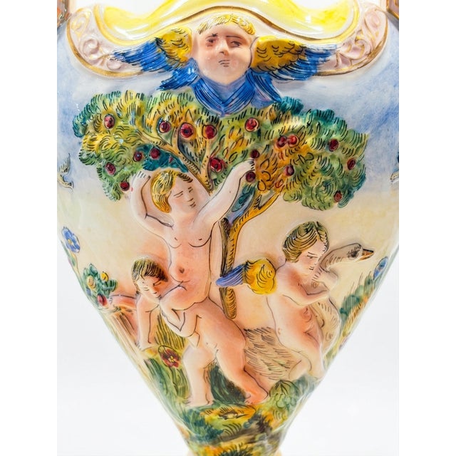 Authentic Vintage Italian Capodimonte table lamp made in the 1960s by artist Veni Sardini. The lamp features mythological...