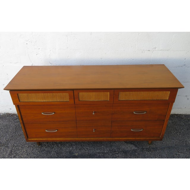 This magnificent Dresser is made of wood, walnut, veneer, caning, and metal. This wonderful Dresser is an excellent...