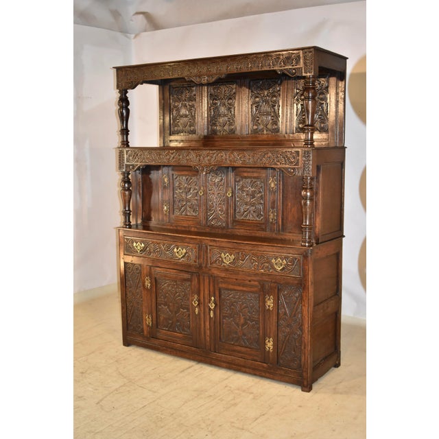 Very unusual early 18th century tridarn press cupboard from England. This piece is truly wonderful. It is unusual in that...