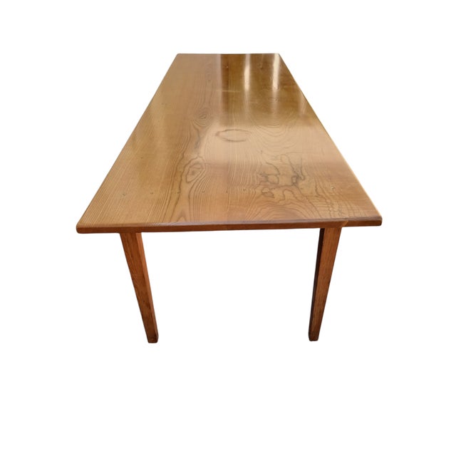Solid elm farmhouse table, varnished finish, 64 cm high under the apron, French made in the 1950s, dowels for assembly,...