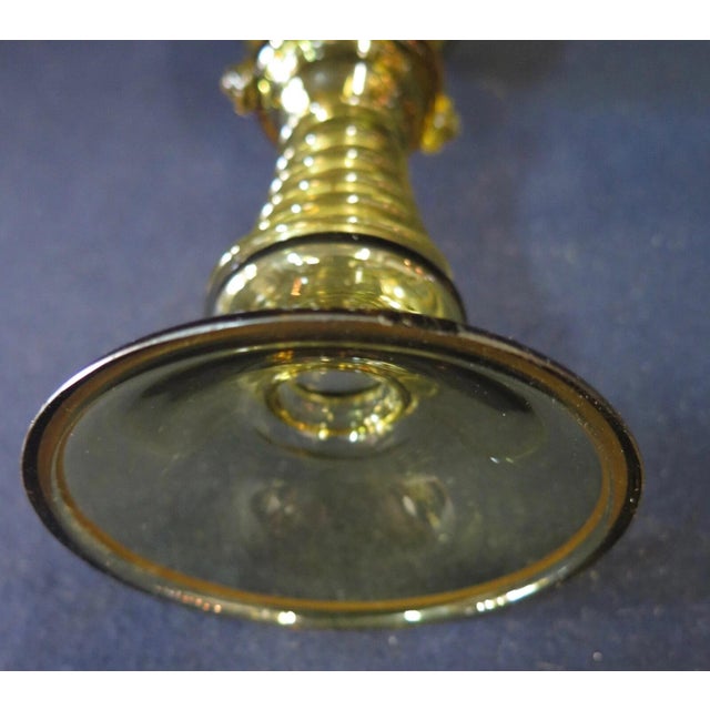 This vintage 19th century hand blown decorated glass goblet is uniquely designed with a beautiful hand rendered enamel...