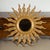French Giltwood Sunburst Mirror with Wavy Sunrays from the Mid-20th Century For Sale - Image 4 of 11