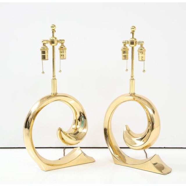 Pair of Pierre Cardin Logo lamps by Erwin Lambeth. The lamps have been Newly Re polished and rewired with adjustable brass...