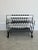 Charming French mag rack made up of wrought iron curls from the feet to the top. A great addition to corral your magazines...