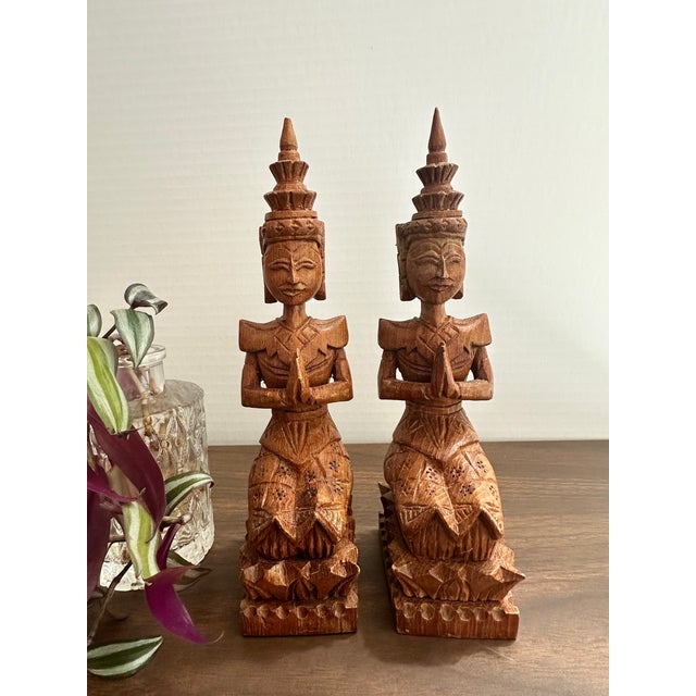 Bring a sense of peace, protection, and sacred beauty into your home with this stunning pair of vintage hand-carved teak...