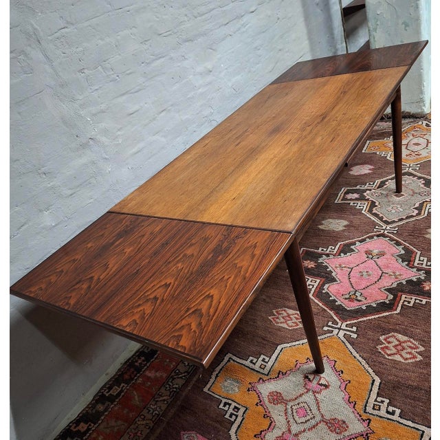 Vemb Mobelfabrik extra large dining table in Santos palisander, 240 cm long extended, 146 cm when closed. 85 cm deep....