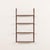 A minimalist wall-mounted shelving system very resemble to the iconic designs of poul cadovius from the 1960s, made in...