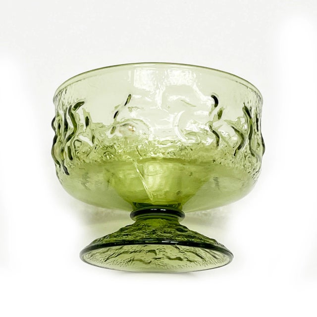 Hailing from the mid century era, this Anchor Hocking set will make a statement in your dining room or home bar. The set...