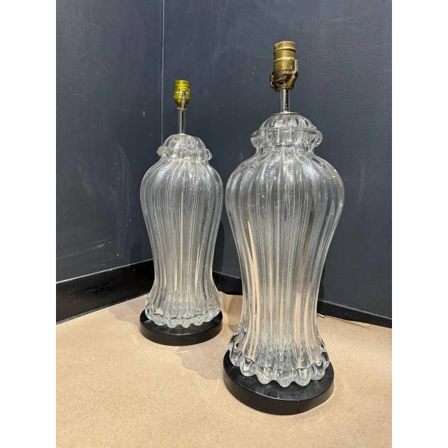 A pair of circa 1930’s hand blown murano glass table lamps.
