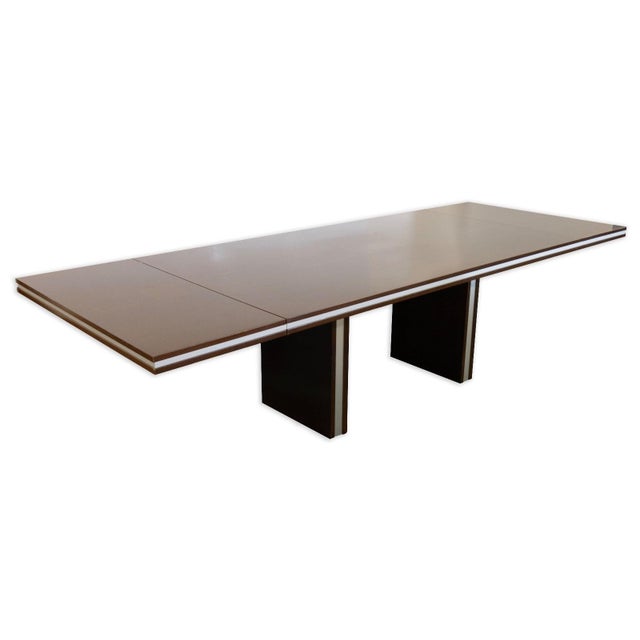 This Excelsior Designs Made in Italy dining room table features a sleek, modern silhouette defined by clean lines and a...