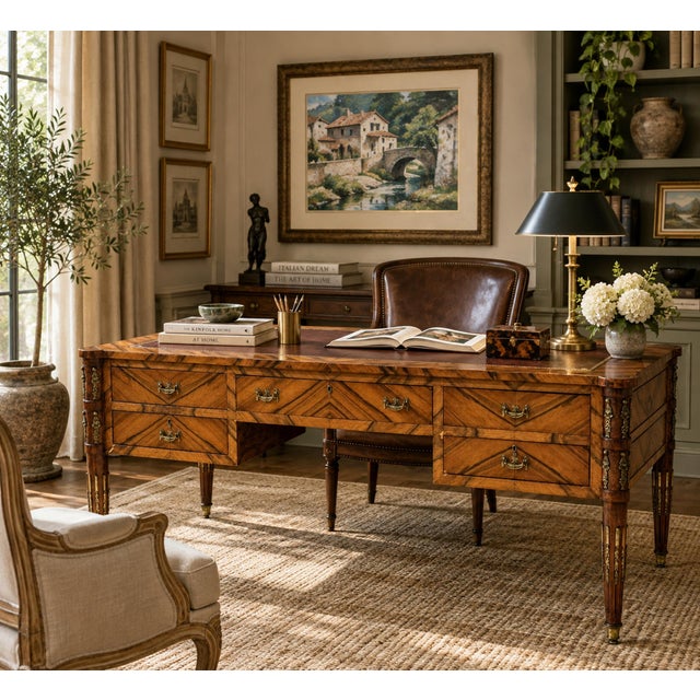 An impressive antique Italian writing desk or partner’s desk, distinguished by richly figured walnut veneers, extensive...