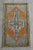A vintage Turkish small yastik rug, bunnt orange color background yastik rug perfect for entryway, bath or in front of the...