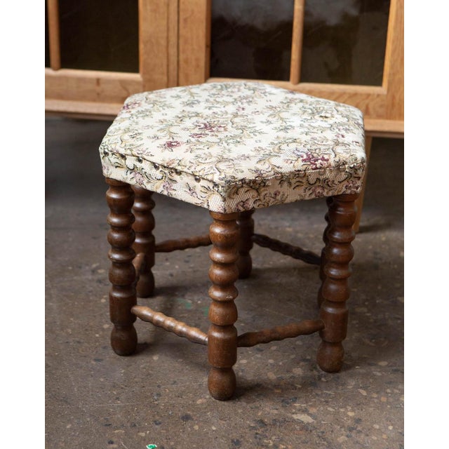 A compact Scandinavian beech stool from the 1950s — spare, well-constructed, and entirely in keeping with the utilitarian...