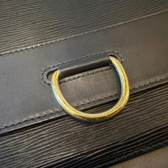 Animal Skin A 1993 Louis Vuitton Jena Black Epi Leather Clutch in Excellent Condition For Sale - Image 7 of 18