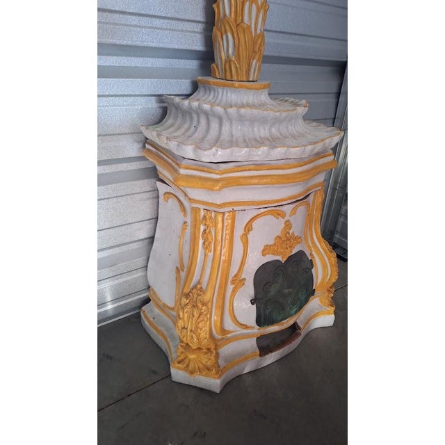 Exuding Old-World European elegance, this spectacular antique Italian majolica glazed terracotta stove is a masterclass in...