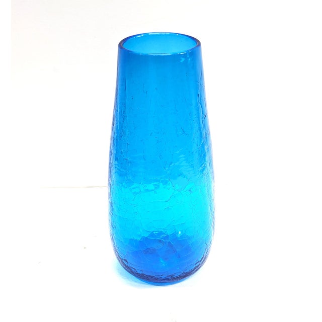 Blenko's "Persian Blue" crackle glass vases were part of the company's Mid-Century Modern designs, popular for their...