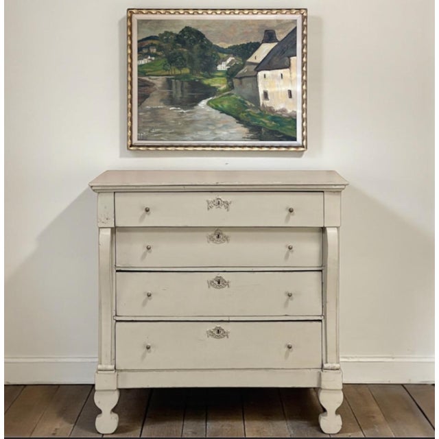 Hailing from Sweden where tailored rustic furniture predominates the countryside, this Antique Gustavian Commode features...