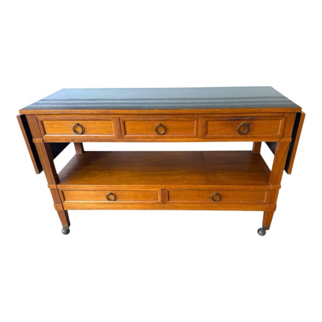 Elegant and versatile, this Baker Furniture Milling Road serving cart embodies the sophisticated balance of classic...