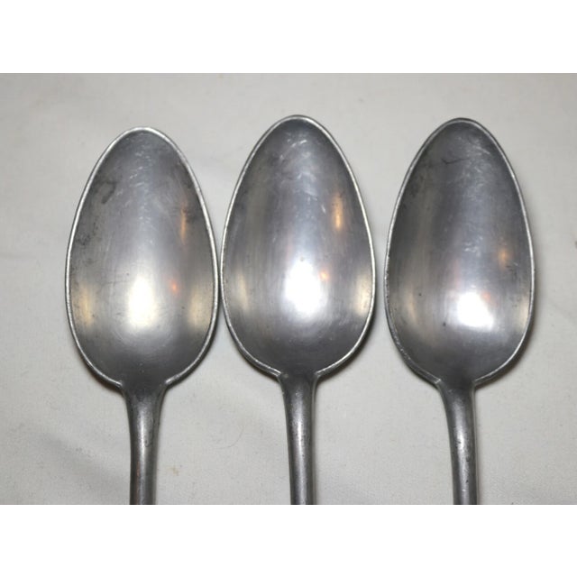 Up for sale is a rare set of 3 late antique 18th century German pewter spoons. They're made of thick pewter and have...