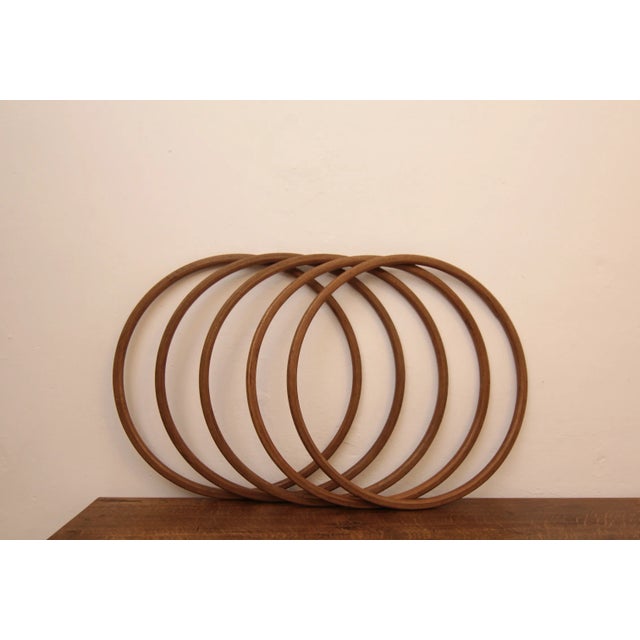 A set of 5 German mid-century same sized beech wooden hula hoop or gymnastic rings. Diameter: 60 cm 2,5 cm x 2,5 cm thick