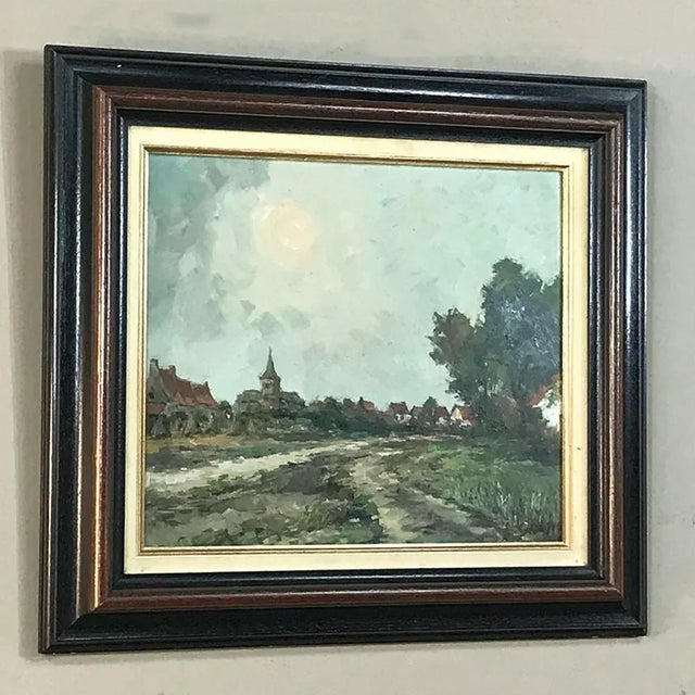 Vintage Framed Oil Painting on Board by A. Sergier is a lovely impressionistic pastoral with a cityscape in the...